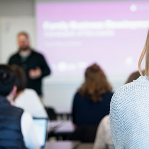 people listening to a seminar