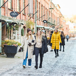 people walking in a street in jönköping